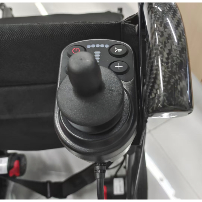 AeroCarbon Electric Wheelchair – Ultra-Lightweight Carbon Fibre Powerchair 22 AeroCarbon Electric Wheelchair – Ultra-Lightweight Carbon Fibre Powerchair attendant bracket